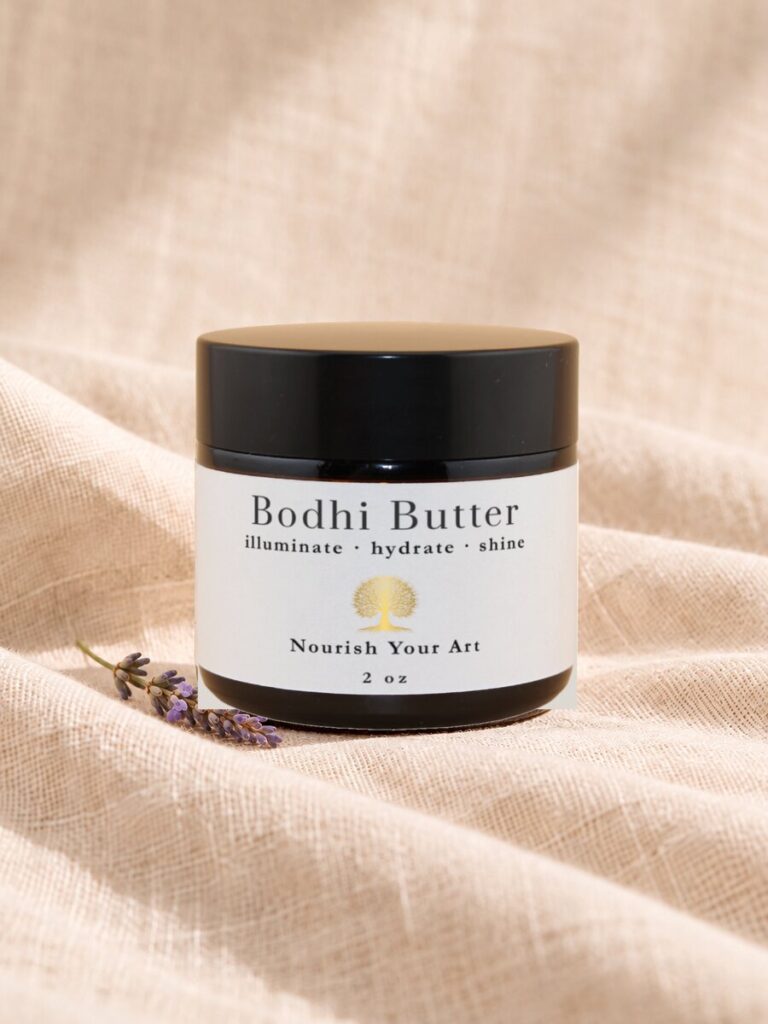 body butter in 2 oz amber jar with lavender sprig