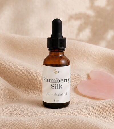 amber bottle with heart gua sha stone
