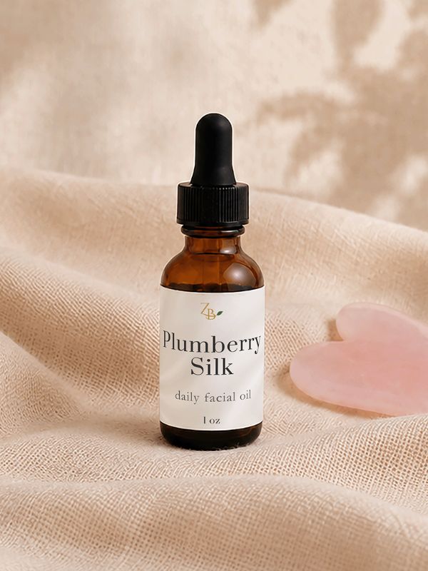 amber bottle with heart gua sha stone