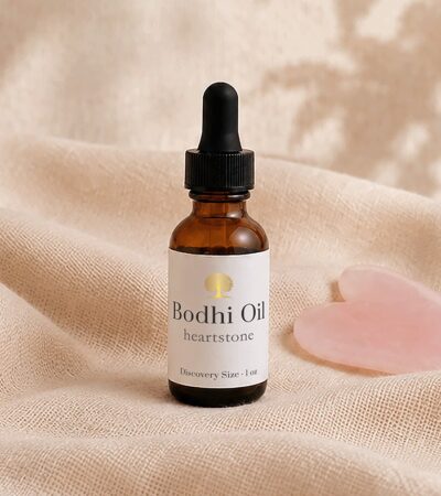 amber bottle with heart gua sha stone