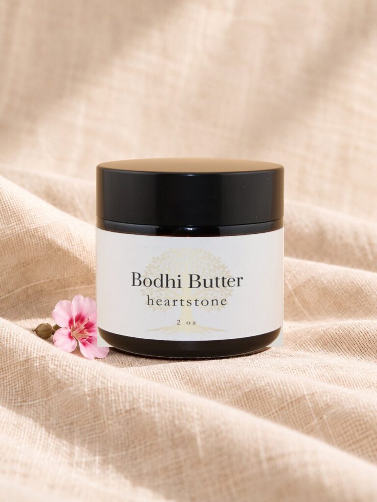 2 oz amber body butter jar with rose geranium