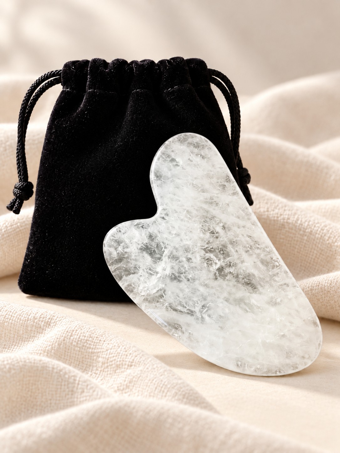 natural white quartz gua sha with black pouch