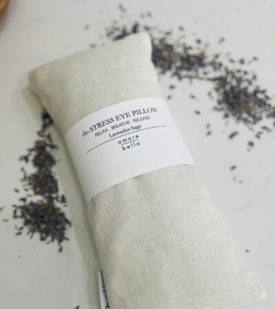 eye pillow in linen pouch and dried lavender on the table